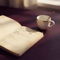 A weekend planner page beside a coffee cup